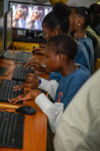 Children at Mogra Children's Home using their new computer lab